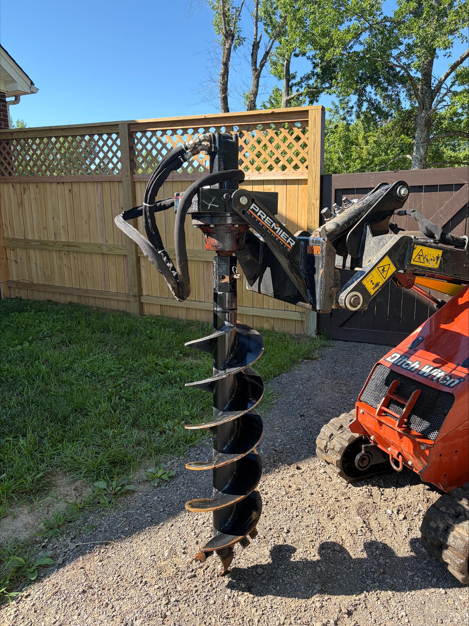 Premier hydraulic auger attachment for rent – Ditch Witch Sk800, Joelton, TN